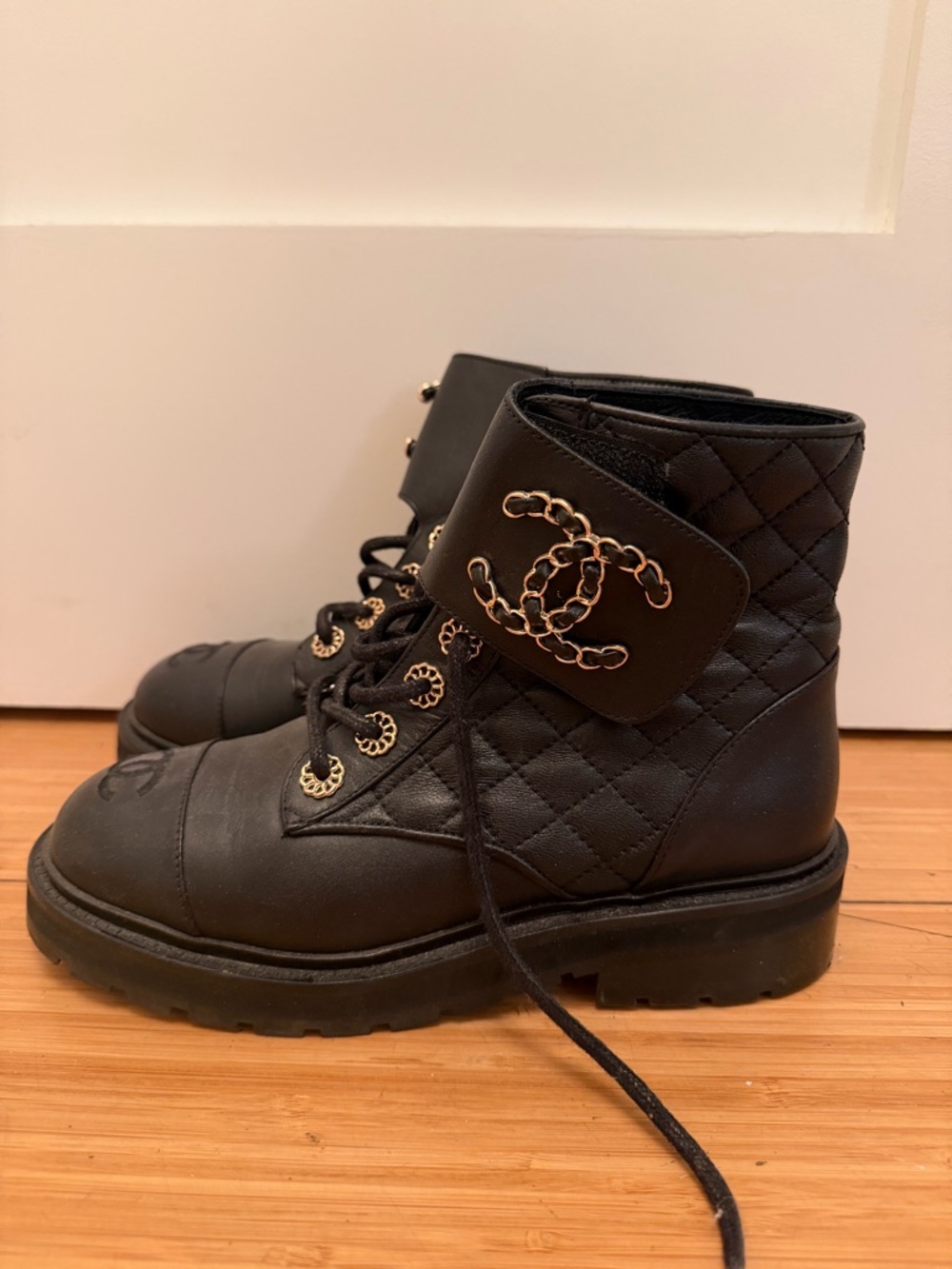 CHANEL Black Leather Quilted Ankle Boots with Gold Chain Accents - Picture 7 of 7